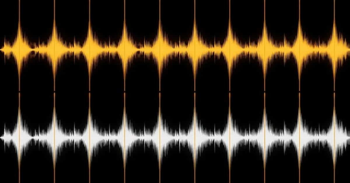 Two track waveforms with their beats aligned on a grid, the visual feedback DJ software gives when learning to beatmatch